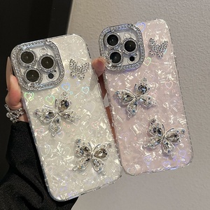 Funda de Teléfono con Mariposa 3D y Pedrería para iPhone 17 Pro Max, Diseño Personalizable, Funda para iPhone 16 15 14 Plus Pro, Venta al Por Mayor - Product Image 1