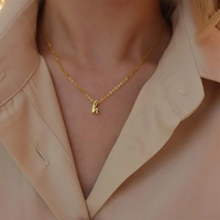 EMANCO Collier en acier inoxydable plaqué or, nouveau pendentif ajouré avec lettres minuscules perforées A-Z, réglable, accessoires pour femmes