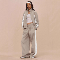 Ensemble tendance décontracté pour femme : veste zippée à rayures color block et pantalon à lacets