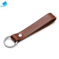 LLavero de piel auténtica clásico de diseño sencillo al por mayor, correa de mano con logotipo personalizado para regalo de promoción, producto artesanal de piel