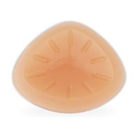 Prothèse mammaire en silicone triangle pour femmes atteintes d'un cancer du sein