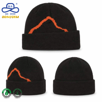 Bonnet tricoté noir personnalisé avec logo, motif montagne orange jacquard, revers plié, hiver, extérieur, unisexe, vente en gros