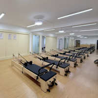 Lit multifonctionnel Cadillac Pilates Reformer de haute qualité Durable et entraînement de yoga amical fabriqué d'érable PU