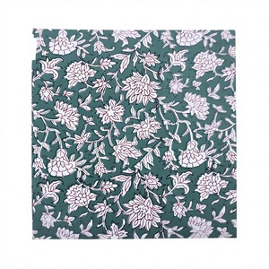 Tissu en coton premium imprimé à la main avec un riche fond vert sauge orné de motifs blancs complexes - Product Image 1