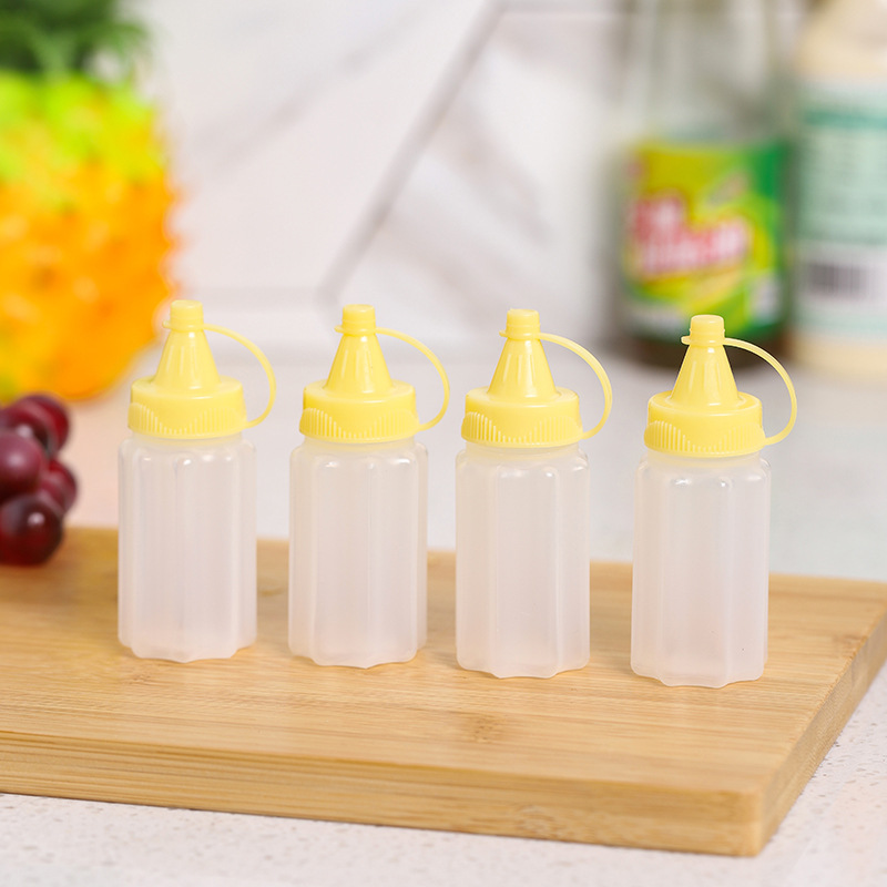 ขวดโปร่งแสงพร้อมฝาสีเหลือง