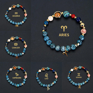 Pulseras de Cuentas de Piedra de Lapislázuli Azul con Manchas Negras de Ocho Planetas <span class=keywords><strong>y</strong></span> Doce Constelaciones Daisy <span class=keywords><strong>Y</strong></span>, Venta Caliente, al por Mayor - Product Image 2