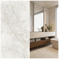 Dalle en porcelaine Statuario White à veissures subtiles 600x1200mm, grand format, pour sol et mur, aspect sans joint, idéale pour villa, appartement, salon