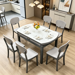 Juego de Mesa de Comedor Ovalada de Piedra Sinterizada, Estilo Moderno y Minimalista, con 6 Sillas, Diseño Extensible para el Comedor del Hogar - Product Image 1
