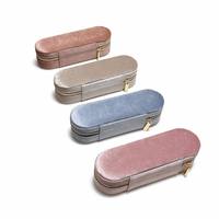 Boîte à bijoux de voyage en velours en forme de pilule, étui à anneaux à 11 compartiments avec fermeture éclair, portable, vente en gros, logo personnalisé, cadeau pour femmes