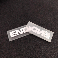 Vente en gros de logo surélevé personnalisé Patch en silicone Autocollant de transfert par presse à chaud Étiquettes en PVC pour vêtements Décoration de vêtements à coudre