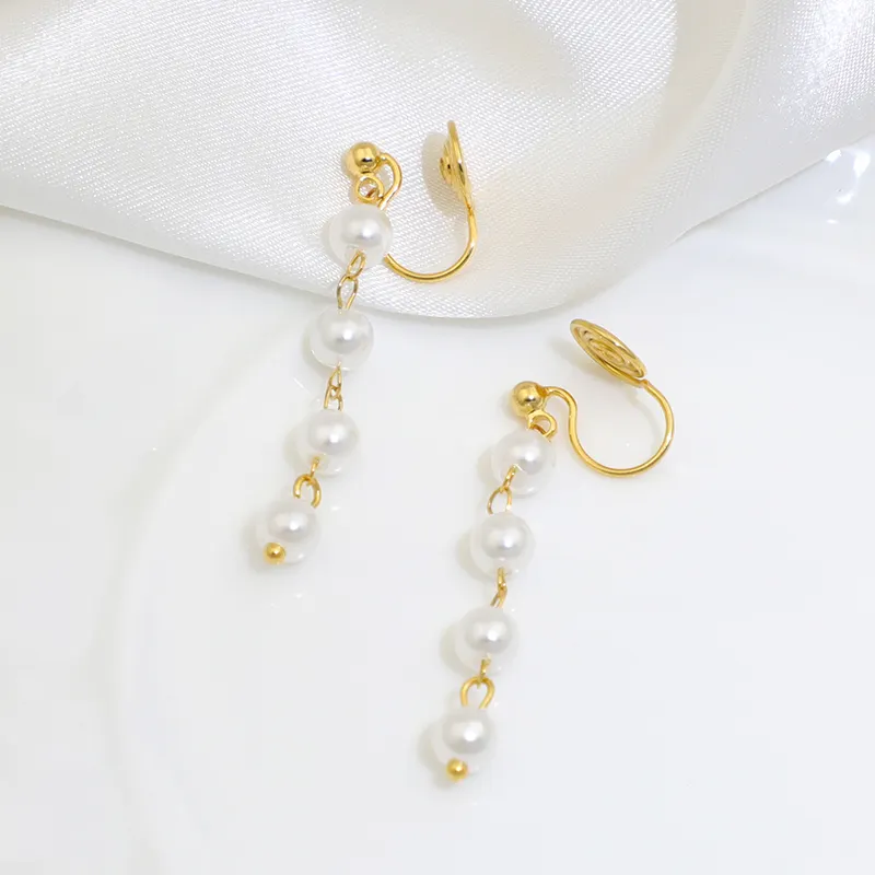 Versione coreana orecchini di perle temperamento femminile retro mosquito coil clip per l'orecchio piercing all'orecchio accessori per l'orecchio famoso design della ragazza