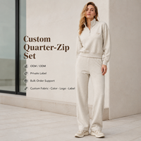 Conjunto de dos piezas OEM ODM para mujer: Sudadera de algodón tipo avena con cremallera de un cuarto y pantalones de chándal de cintura alta de pierna ancha estilo streetwear.