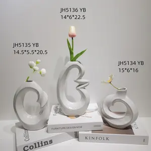 Decorazione casa soggiorno vaso nordico circolare cavo ceramica ciambelle vaso di fiori
