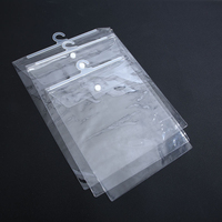 Sacs zip-lock transparents transparents en poly pour vêtements Sacs d'emballage en PVC personnalisés pour vêtements avec crochet