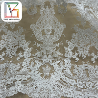 Haute qualité cordon de mariée broderie Sequin Tulle dentelle tissu lourd blanc paillettes brodé maille dentelle tissu pour robe de mariée