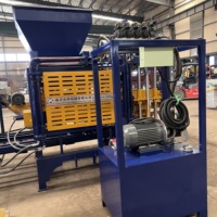 Machine à base de ciment QT4-15B pour la fabrication d'unités de construction, de blocs paysagers et de matériaux de pavage durables