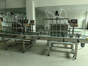 Remplisseuse automatique d'<span class=keywords><strong>eau</strong></span> à 4 têtes haute vitesse, machine de remplissage automatique de liquides, remplisseuse automatique de nettoyant pour verre à petite échelle - Product Image 3