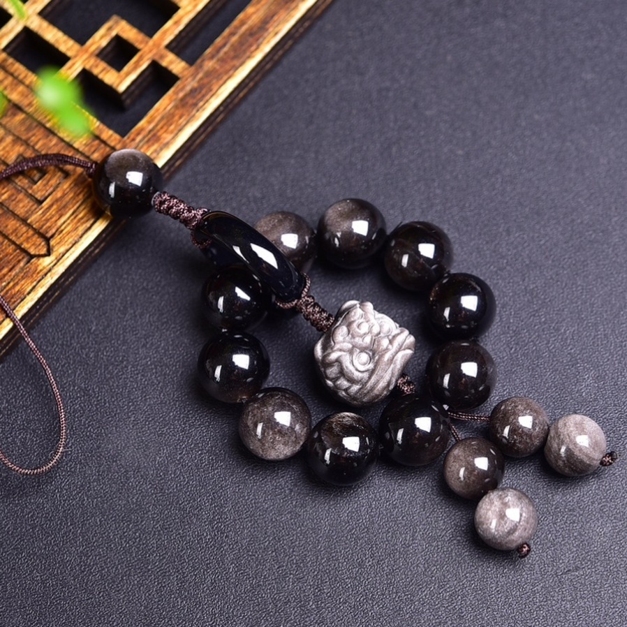 1. Danza del Leone in Ossidiana Argentata