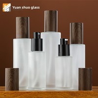 Flacon distributeur d'huile essentielle en bois grainé givré, flacon de lotion à fond épaissi, flacon de lotion cosmétique en verre à fond en bois