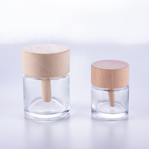 Eco Friendly 50ml Round Food Package Storage Glass Jar with Bamboo Wood Lid - Product Image 1