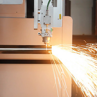 Machine de découpe laser fibre CNC pour plaques et tubes métalliques 3000x1500mm avec système de refroidissement par eau et groupe de pompes, compatible IPG Raycus