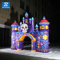 Arche d'entrée gonflable en forme de château violet avec crâne, utilisée pour la décoration d'événements d'Halloween