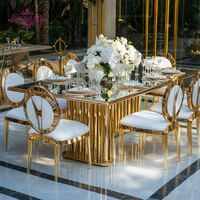 Table de salle à manger de luxe durable en or moderne pour hôtel et mariage avec structure en acier inoxydable et plateau en verre miroir