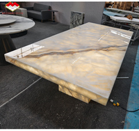 Table de salle à manger en onyx beige rétro-éclairé en pierre Brother Nouveau design Table de salle à manger avec effet de lumière LED Marbre d'onyx de luxe