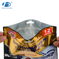 Sachet d'emballage personnalisé pour capsules de lave-vaisselle, type stand-up, pour la vente au détail et l'emballage de produits d'entretien ménager, avec trou de suspension et impression métallique
