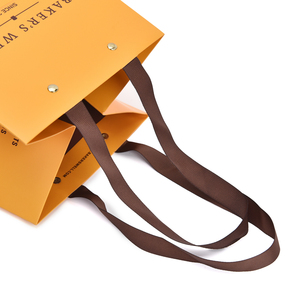 OEM Custom Logo Kraft Paper <b>Bag</b> with Rivet & Ribbon Handle Matte Lamination Eco-Friendly Gift Packaging for Bakery Wholesale - Product Image 3