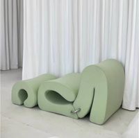Canapé moderne italien minimaliste à effet d'ondulation, canapé en tissu velours d'agneau incurvé de luxe léger pour villa ou appartement