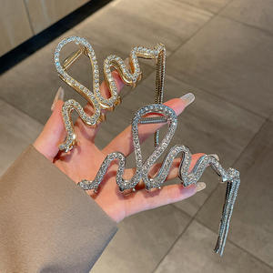 Holesale-diamantes de imitación coreanos, garra de pelo dorado de cristal con cadena de borla, clip de garra de cristal de metal - Product Image 5