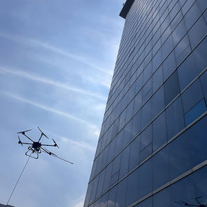 Powerful Cleaning Drone Tethered Drone Building Washing Drone for Facade and Billboards with High Efficiency and Long Endurance - Product Image 1