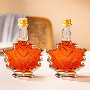 Vente en gros de flacons en verre pour sirop en forme de feuille d'<span class=keywords><strong>érable</strong></span> avec bouchon <span class=keywords><strong>à</strong></span> vis de 50 ml, 100 ml, 250 ml, flacons en verre pour liqueur en forme de feuilles d'<span class=keywords><strong>érable</strong></span> avec couvercle - Product Image 6