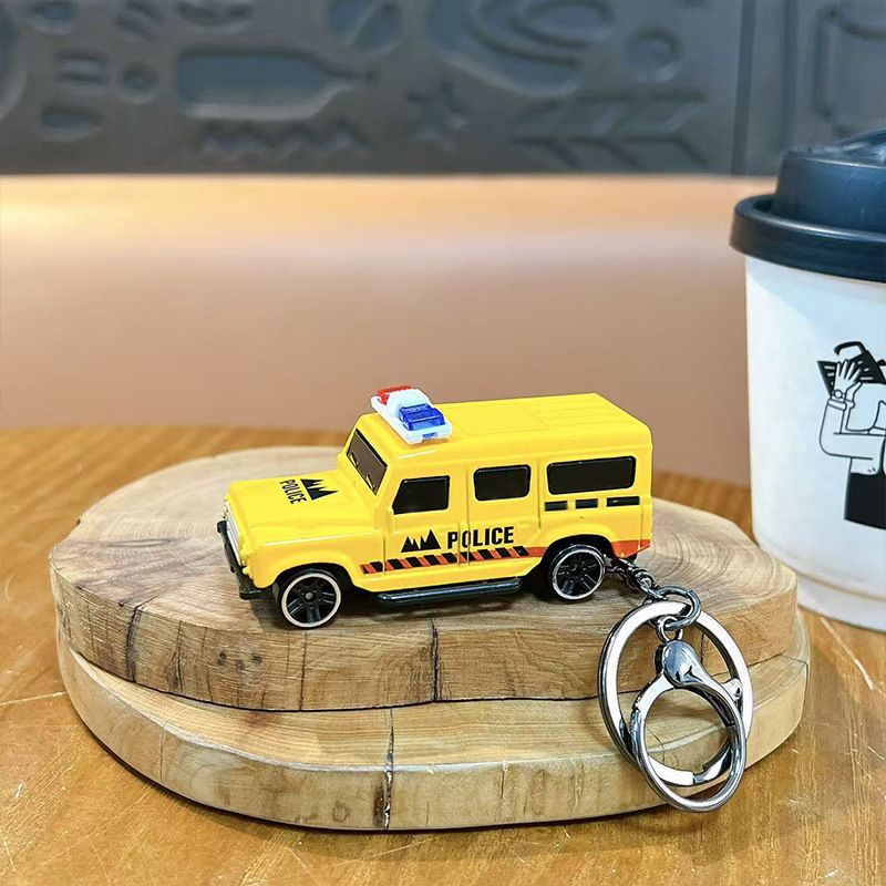 Yellow alloy pull-back police car pendant