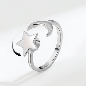 Anillo giratorio XINGX de moda transfronteriza para mujer, ajustable para el dedo anular, con diseño luminoso de estrella y luna. - Product Image 1