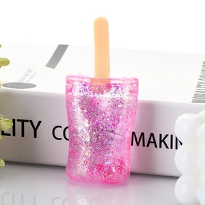 Jouet anti-stress souple et compressible en forme de bâtonnet de crème glacée à paillettes effet sable mouvant - Acheter - Product Image 4
