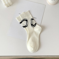 Longues chaussettes mignonnes femmes tricot coton équipage Kawaii belles dames chaussettes de créateur haut Art chaud Sokken Femme
