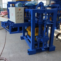 Machine à fabriquer des briques à faible coût QT40-2 pour l'Afrique - Machine semi-automatique à blocs creux en béton pour le Nigéria, le Ghana, le Kenya