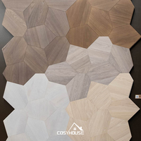 Parquet géométrique sur mesure en noyer noir, motif hexagonal, pour projets de villas et hôtels de luxe