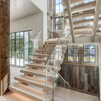 Escalier flottant moderne en bois pour intérieur avec garde-corps en verre sans cadre, ensemble d'escaliers à montantes ouvertes pour villa