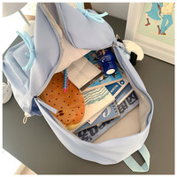 Sac à dos scolaire léger pour adolescentes HAIBOWY, multi-poches, mignon, avec nœud décoratif, pour activités de plein air et sport