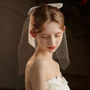 Bonne qualité Xinmeiji V734 français grande maille <span class=keywords><strong>voile</strong></span> de mariée blanc court noeud papillon inscription en ligne célébrité chapeaux en gros - Product Image 4