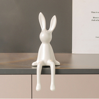 Figurine lapin assis en céramique peinte à la main en gros décor de noyau de chalet émaillé pour cadeau d'accent de pépinière de jardin de Pâques en vrac