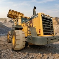 Gebrauchter Komatsu WA600 Vier-in-Eins-Planenschaufel- und Greifer-Radlader für die Materialhandhabung von gemischten Hofmaterialien