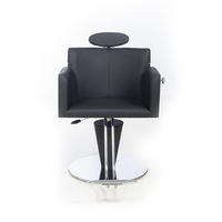 Chaise de barbier noire élégante vintage haut de gamme avec accessoires de quincaillerie uniques pour salon de coiffure