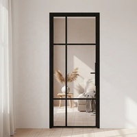 Porte double française en métal à 8 panneaux avec verre transparent de la collection Classic Grid, alliant charme et design industriel moderne