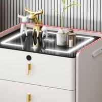 Table basse Lumio au design moderne avec éclairage LED, recharge sans fil, tiroir de refroidissement, système audio intégré, plateau en marbre, maison intelligente