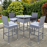 Ensemble de jardin moderne et durable, mobilier de patio, table et chaises en acier et rotin avec verre trempé pour utilisation en entrepôt