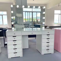 Coiffeuse de luxe européenne en bois, best-seller, avec miroir éclairé et lumières LED réglables, et tabouret